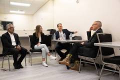 AUSTIN, TEXAS - MARCH 11: (L-R) Hari Ravichandran, Maria Konnikova, Eric O?Neill, and Robert Downey Jr. speak backstage before the 'Online Crime: An American Crisis' SXSW panel on March 11, 2023 in Austin, Texas. (Photo by Mat Hayward/Getty Images for Aura )