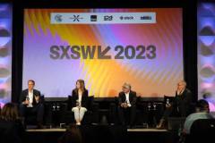 AUSTIN, TEXAS - MARCH 11: (L-R) Eric O'Neill, Maria Konnikova, Hari Ravichandran, and Robert Downey Jr. speak onstage during the 'Online Crime: An American Crisis' SXSW panel on March 11, 2023 in Austin, Texas. (Photo by Mat Hayward/Getty Images for Aura )