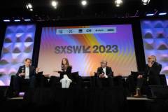 AUSTIN, TEXAS - MARCH 11: (L-R) Eric O'Neill, Maria Konnikova, Hari Ravichandran, and Robert Downey Jr. speak onstage during the 'Online Crime: An American Crisis' SXSW panel on March 11, 2023 in Austin, Texas. (Photo by Mat Hayward/Getty Images for Aura )