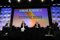 AUSTIN, TEXAS - MARCH 11: (L-R) Eric O'Neill, Maria Konnikova, Hari Ravichandran, and Robert Downey Jr. speak onstage during the 'Online Crime: An American Crisis' SXSW panel on March 11, 2023 in Austin, Texas. (Photo by Mat Hayward/Getty Images for Aura )