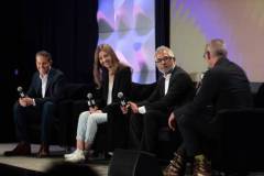 AUSTIN, TEXAS - MARCH 11: (L-R) Eric O'Neill, Maria Konnikova, Hari Ravichandran, and Robert Downey Jr. speak onstage during the 'Online Crime: An American Crisis' SXSW panel on March 11, 2023 in Austin, Texas. (Photo by Mat Hayward/Getty Images for Aura )