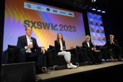 AUSTIN, TEXAS - MARCH 11: (L-R) Eric O'Neill, Maria Konnikova, Hari Ravichandran, and Robert Downey Jr. speak onstage during the 'Online Crime: An American Crisis' SXSW panel on March 11, 2023 in Austin, Texas. (Photo by Mat Hayward/Getty Images for Aura )