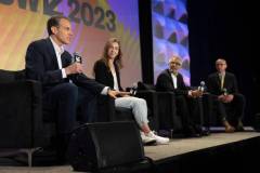 AUSTIN, TEXAS - MARCH 11: (L-R) Eric O'Neill, Maria Konnikova, Hari Ravichandran, and Robert Downey Jr. speak onstage during the 'Online Crime: An American Crisis' SXSW panel on March 11, 2023 in Austin, Texas. (Photo by Mat Hayward/Getty Images for Aura )
