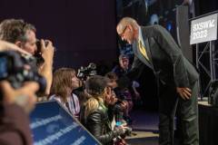 AUSTIN, TEXAS - MARCH 11:  Robert Downey Jr. asks a photographer a question during the 'Online Crime: An American Crisis' SXSW panel on March 11, 2023 in Austin, Texas. (Photo by Mat Hayward/Getty Images for Aura )