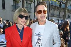 PARIS, FRANCE - OCTOBER 02: Editor-In-Chief of American Vogue and Chief Content Officer of Conde Nast Dame Anna Wintour and Robert Downey Jr. attend the Stella McCartney show during Paris Fashion Week Womenswear Spring/Summer 2024 on October 2, 2023 in Paris, France. (Photo by Dave Benett/Getty Images for Stella McCartney)