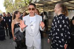 PARIS, FRANCE - OCTOBER 02: (L to R) Susan Downey, Robert Downey Jr. and Julia Milner attend the Stella McCartney show during Paris Fashion Week Womenswear Spring/Summer 2024 on October 2, 2023 in Paris, France. (Photo by Dave Benett/Getty Images for Stella McCartney)