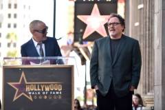 HOLLYWOOD, CALIFORNIA - FEBRUARY 13: (L-R) Robert Downey Jr. and Jon Favreau speak onstage during the ceremony honoring Jon Favreau with a Star on the Hollywood Walk of Fame on February 13, 2023 in Hollywood, California. (Photo by Alberto E. Rodriguez/Getty Images for Disney)