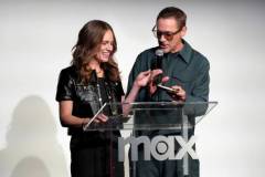 LOS ANGELES, CALIFORNIA - JUNE 16: (L-R) Susan Downey and Robert Downey Jr. speak onstage at Max's Downey's Dream Cars Tastemaker Event at Petersen Automotive Museum on June 16, 2023 in Los Angeles, California. (Photo by Jeff Kravitz/FilmMagic for Max)