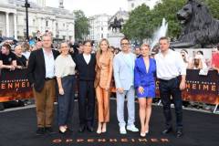 LONDON, ENGLAND - JULY 12: (L-R) Christopher Nolan, Emma Thomas, Cillian Murphy, Emily Blunt, Robert Downey Jr., Florence Pugh and Matt Damon attend a photocall for "Oppenheimer" in Trafalgar Square on July 12, 2023 in London, England. (Photo by David M. Benett/Jed Cullen/Dave Benett/WireImage)