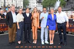 LONDON, ENGLAND - JULY 12: (L-R) Christopher Nolan, Emma Thomas, Cillian Murphy, Emily Blunt, Robert Downey Jr., Florence Pugh and Matt Damon attend a photocall for "Oppenheimer" in Trafalgar Square on July 12, 2023 in London, England. (Photo by David M. Benett/Jed Cullen/Dave Benett/WireImage)