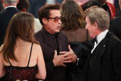Robert Downey Jr. and Martin Short at the 81st Golden Globe Awards held at the Beverly Hilton Hotel on January 7, 2024 in Beverly Hills, California. (Photo by Rich Polk/Golden Globes 2024/Golden Globes 2024 via Getty Images)