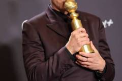 Robert Downey Jr. poses with the award for Best Performance by a Male Actor in a Supporting Role in any Motion Picture for "Oppenheimer" at the 81st Golden Globe Awards held at the Beverly Hilton Hotel on January 7, 2024 in Beverly Hills, California. (Photo by John Salangsang/Golden Globes 2024/Golden Globes 2024 via Getty Images)