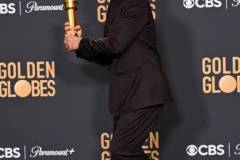 Robert Downey Jr. poses with the award for Best Performance by a Male Actor in a Supporting Role in any Motion Picture for his role in "Oppenheimer" at the 81st Golden Globe Awards held at the Beverly Hilton Hotel on January 7, 2024 in Beverly Hills, California. (Photo by Gilbert Flores/Golden Globes 2024/Golden Globes 2024 via Getty Images)