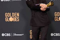 Robert Downey Jr. poses with the award for Best Performance by a Male Actor in a Supporting Role in any Motion Picture for his role in "Oppenheimer" at the 81st Golden Globe Awards held at the Beverly Hilton Hotel on January 7, 2024 in Beverly Hills, California. (Photo by Gilbert Flores/Golden Globes 2024/Golden Globes 2024 via Getty Images)