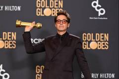 Robert Downey Jr. poses with the award for Best Performance by a Male Actor in a Supporting Role in any Motion Picture for his role in "Oppenheimer" at the 81st Golden Globe Awards held at the Beverly Hilton Hotel on January 7, 2024 in Beverly Hills, California. (Photo by Gilbert Flores/Golden Globes 2024/Golden Globes 2024 via Getty Images)