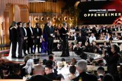 Oprah Winfrey, Emma Thomas, Christopher Nolan, Robert Downey Jr., Charles Roven, Matt Damon and Ludwig G?ransson at the 81st Golden Globe Awards held at the Beverly Hilton Hotel on January 7, 2024 in Beverly Hills, California. (Photo by Michael Buckner/Golden Globes 2024/Golden Globes 2024 via Getty Images)