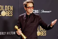 BEVERLY HILLS, CALIFORNIA - JANUARY 07: Robert Downey Jr., winner of the Best Performance by a Male Actor in a Supporting Role in any Motion Picture award for "Oppenheimer," poses in the press room during the 81st Annual Golden Globe Awards at The Beverly Hilton on January 07, 2024 in Beverly Hills, California. (Photo by Kevin Mazur/Getty Images)