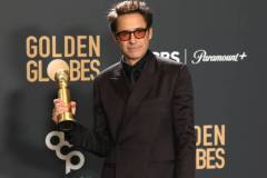 BEVERLY HILLS, CALIFORNIA - JANUARY 07: Robert Downey Jr., winner of the Best Performance by a Male Actor in a Supporting Role in any Motion Picture award for "Oppenheimer," poses in the press room during the 81st Annual Golden Globe Awards at The Beverly Hilton on January 07, 2024 in Beverly Hills, California. (Photo by Kevin Mazur/Getty Images)