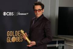 BEVERLY HILLS, CALIFORNIA - JANUARY 07: Robert Downey Jr., winner of the Best Performance by a Male Actor in a Supporting Role in any Motion Picture award for "Oppenheimer," poses in the press room during the 81st Annual Golden Globe Awards at The Beverly Hilton on January 07, 2024 in Beverly Hills, California. (Photo by Kevin Mazur/Getty Images)