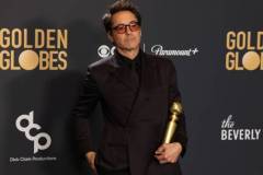 BEVERLY HILLS, CALIFORNIA - JANUARY 07: Robert Downey Jr., winner of the Best Performance by a Male Actor in a Supporting Role in any Motion Picture award for "Oppenheimer," poses in the press room during the 81st Annual Golden Globe Awards at The Beverly Hilton on January 07, 2024 in Beverly Hills, California. (Photo by Kevin Mazur/Getty Images)