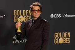 BEVERLY HILLS, CALIFORNIA - JANUARY 07: Robert Downey Jr., winner of the Best Performance by a Male Actor in a Supporting Role in any Motion Picture award for "Oppenheimer," poses in the press room during the 81st Annual Golden Globe Awards at The Beverly Hilton on January 07, 2024 in Beverly Hills, California. (Photo by Kevin Mazur/Getty Images)