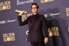 BEVERLY HILLS, CALIFORNIA - JANUARY 07: Robert Downey Jr., winner of the Best Performance by a Male Actor in a Supporting Role in any Motion Picture award for "Oppenheimer," poses in the press room during the 81st Annual Golden Globe Awards at The Beverly Hilton on January 07, 2024 in Beverly Hills, California. (Photo by Matt Winkelmeyer/WireImage)