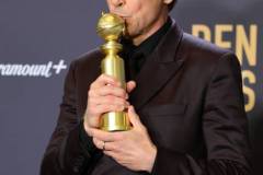 BEVERLY HILLS, CALIFORNIA - JANUARY 07: Robert Downey Jr., winner of the Best Performance by a Male Actor in a Supporting Role in any Motion Picture award for "Oppenheimer," poses in the press room during the 81st Annual Golden Globe Awards at The Beverly Hilton on January 07, 2024 in Beverly Hills, California. (Photo by Matt Winkelmeyer/WireImage)