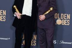 BEVERLY HILLS, CALIFORNIA - JANUARY 7: Cillian Murphy and Robert Downey Jr poses in the press room during the 81st Annual Golden Globe Awards at The Beverly Hilton on January 7, 2024 in Beverly Hills, California. (Photo by Steve Granitz/FilmMagic)