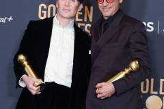 BEVERLY HILLS, CALIFORNIA - JANUARY 7: Cillian Murphy and Robert Downey Jr poses in the press room during the 81st Annual Golden Globe Awards at The Beverly Hilton on January 7, 2024 in Beverly Hills, California. (Photo by Steve Granitz/FilmMagic)
