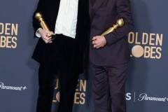 BEVERLY HILLS, CALIFORNIA - JANUARY 7: Cillian Murphy and Robert Downey Jr poses in the press room during the 81st Annual Golden Globe Awards at The Beverly Hilton on January 7, 2024 in Beverly Hills, California. (Photo by Steve Granitz/FilmMagic)