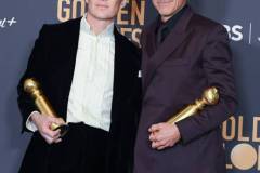 BEVERLY HILLS, CALIFORNIA - JANUARY 7: Cillian Murphy and Robert Downey Jr poses in the press room during the 81st Annual Golden Globe Awards at The Beverly Hilton on January 7, 2024 in Beverly Hills, California. (Photo by Steve Granitz/FilmMagic)