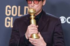 BEVERLY HILLS, CALIFORNIA - JANUARY 7: Robert Downey Jr poses in the press room during the 81st Annual Golden Globe Awards at The Beverly Hilton on January 7, 2024 in Beverly Hills, California. (Photo by Steve Granitz/FilmMagic)