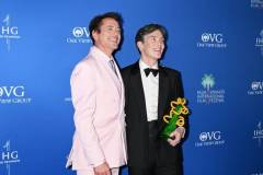 Robert Downey Jr. and Cillian Murphy, winner of the Desert Palm Achievement Award, pose in the press room at the 2024 Palm Springs International Film Festival Film Awards held at the Palm Springs Convention Center on January 4, 2024 in Palm Springs, California. (Photo by Gilbert Flores/Variety via Getty Images)