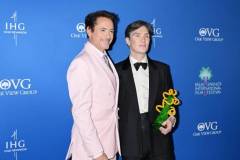 Robert Downey Jr. and Cillian Murphy, winner of the Desert Palm Achievement Award, pose in the press room at the 2024 Palm Springs International Film Festival Film Awards held at the Palm Springs Convention Center on January 4, 2024 in Palm Springs, California. (Photo by Gilbert Flores/Variety via Getty Images)