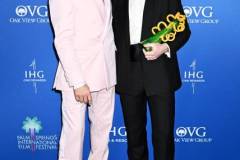 Robert Downey Jr. and Cillian Murphy, winner of the Desert Palm Achievement Award, pose in the press room at the 2024 Palm Springs International Film Festival Film Awards held at the Palm Springs Convention Center on January 4, 2024 in Palm Springs, California. (Photo by Gilbert Flores/Variety via Getty Images)