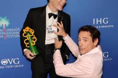PALM SPRINGS, CALIFORNIA - JANUARY 04: Cillian Murphy, winner of the Desert Palm Achievement Award, and Robert Downey Jr. pose in the press room during the 2024 Palm Springs International Film Festival Film Awards at Palm Springs Convention Center on January 04, 2024 in Palm Springs, California. (Photo by Kevin Winter/Getty Images)