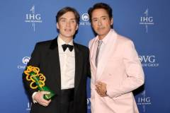 PALM SPRINGS, CALIFORNIA - JANUARY 04: Cillian Murphy, winner of the Desert Palm Achievement Award, and Robert Downey Jr. pose in the press room during the 2024 Palm Springs International Film Festival Film Awards at Palm Springs Convention Center on January 04, 2024 in Palm Springs, California. (Photo by Kevin Winter/Getty Images)
