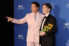 PALM SPRINGS, CALIFORNIA - JANUARY 04: (L-R) Robert Downey Jr. and Cillian Murphy, winner of the Desert Palm Achievement Award, pose in the press room during the 2024 Palm Springs International Film Festival Film Awards at Palm Springs Convention Center on January 04, 2024 in Palm Springs, California. (Photo by Kevin Winter/Getty Images)