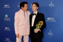 PALM SPRINGS, CALIFORNIA - JANUARY 04: (L-R) Robert Downey Jr. and Cillian Murphy, winner of the Desert Palm Achievement Award, pose in the press room during the 2024 Palm Springs International Film Festival Film Awards at Palm Springs Convention Center on January 04, 2024 in Palm Springs, California. (Photo by Kevin Winter/Getty Images)