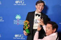 PALM SPRINGS, CALIFORNIA - JANUARY 04: (L-R) Cillian Murphy, winner of the Desert Palm Achievement Award for "Oppenheimer,"  and Robert Downey Jr. pose backstage during the 35th Annual Palm Springs International Film Awards, Sponsored by IHG Hotels & Resorts, at Palm Springs Convention Center on January 04, 2024 in Palm Springs, California. (Photo by Amy Sussman/Getty Images for IHG Hotels & Resorts)