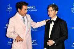 PALM SPRINGS, CALIFORNIA - JANUARY 04: Robert Downey Jr. and Cillian Murphy arrive at the 2024 Palm Springs International Film Festival Film Awards at the Palm Springs Convention Center on January 04, 2024 in Palm Springs, California. (Photo by Jerod Harris/FilmMagic)