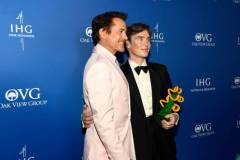 PALM SPRINGS, CALIFORNIA - JANUARY 04: (L-R) Robert Downey Jr. and Cillian Murphy, winner of the Desert Palm Achievement Award for "Oppenheimer," pose backstage during the 35th Annual Palm Springs International Film Awards at Palm Springs Convention Center on January 04, 2024 in Palm Springs, California. (Photo by Presley Ann/Getty Images for Palm Springs International Film Society)
