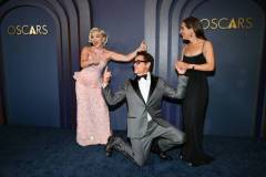 Florence Pugh, Robert Downey Jr. and Susan Downey at the 14th Governors Awards held at The Ray Dolby Ballroom at Ovation Hollywood on January 9, 2024 in Los Angeles, California. (Photo by Michael Buckner/Variety via Getty Images)