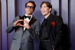 HOLLYWOOD, CALIFORNIA - JANUARY 09: (L-R) Robert Downey Jr. and Cillian Murphy attend the Academy Of Motion Picture Arts & Sciences' 14th Annual Governors Awards at The Ray Dolby Ballroom on January 09, 2024 in Hollywood, California. (Photo by Emma McIntyre/WireImage)