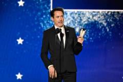 Robert Downey Jr. accepts the Best Supporting Actor Award for "Oppenheimer" at The 29th Critics' Choice Awards held at The Barker Hangar on January 14, 2024 in Santa Monica, California. (Photo by Michael Buckner/Variety via Getty Images)