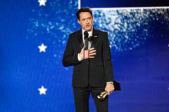 Robert Downey Jr. accepts the Best Supporting Actor Award for "Oppenheimer" at The 29th Critics' Choice Awards held at The Barker Hangar on January 14, 2024 in Santa Monica, California. (Photo by Michael Buckner/Variety via Getty Images)