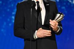 Robert Downey Jr. accepts the Best Supporting Actor Award for "Oppenheimer" at The 29th Critics' Choice Awards held at The Barker Hangar on January 14, 2024 in Santa Monica, California. (Photo by Michael Buckner/Variety via Getty Images)