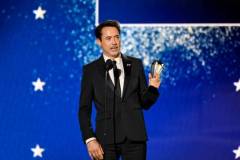 Robert Downey Jr. accepts the Critic's Choice Award for Best Supporting Actor for "Oppenheimer" at The 29th Critics' Choice Awards held at The Barker Hangar on January 14, 2024 in Santa Monica, California. (Photo by Michael Buckner/Variety via Getty Images)