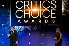 Robert Downey Jr. accepts the Critic's Choice Award for Best Supporting Actor for "Oppenheimer" alongside Angela Bassett at The 29th Critics' Choice Awards held at The Barker Hangar on January 14, 2024 in Santa Monica, California. (Photo by Michael Buckner/Variety via Getty Images)