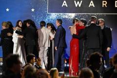 David Krumholtz, Claire Kaufman, Ruth De Jong, Alden Ehrenreich, Emma Thomas, Emily Blunt, Cillian Murphy, Christopher Nolan, Charles Roven and Robert Downey Jr. accept the Best Picture Award for 'Oppenheimer' at The 29th Critics' Choice Awards held at The Barker Hangar on January 14, 2024 in Santa Monica, California. (Photo by Michael Buckner/Variety via Getty Images)